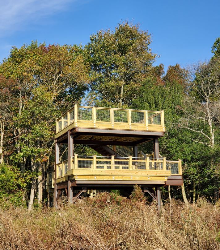 A wooden two-deck observation tower. 