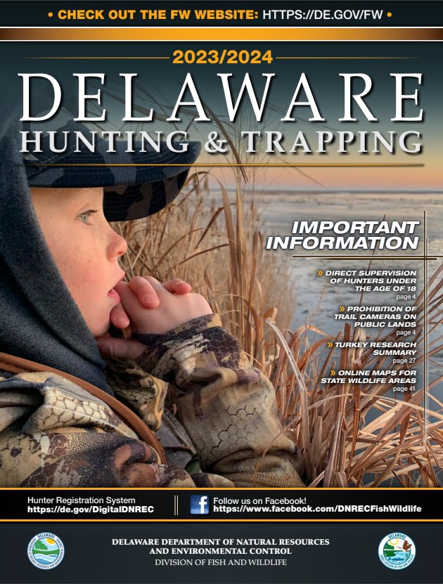 Cover of the Delaware Hunting and Trapping Guide, showing a young boy bundled up in hunting gear looking out over a water body.