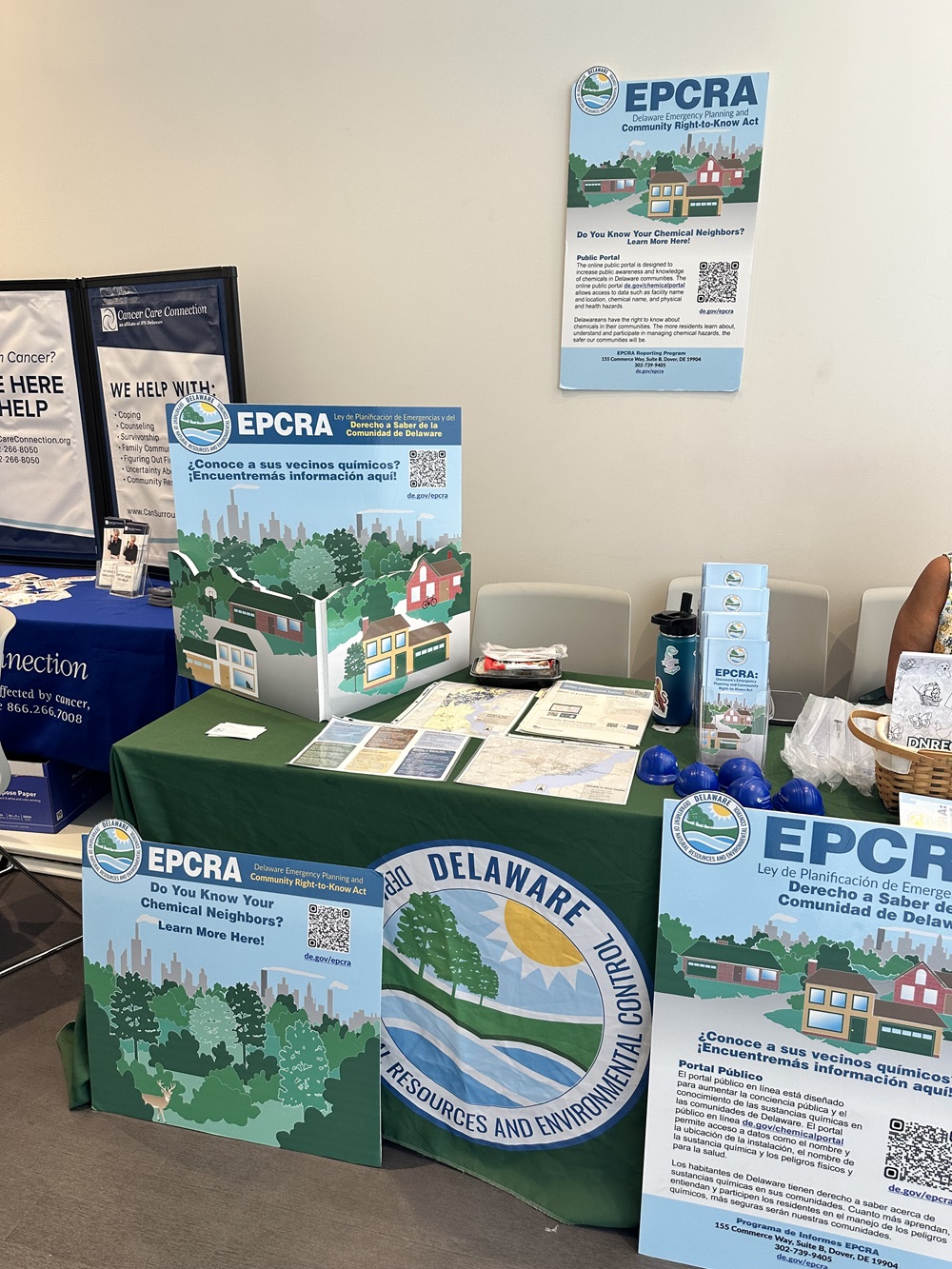 Displays highlighting an emergency planning act dealing with hazardous substances are set up at a table.