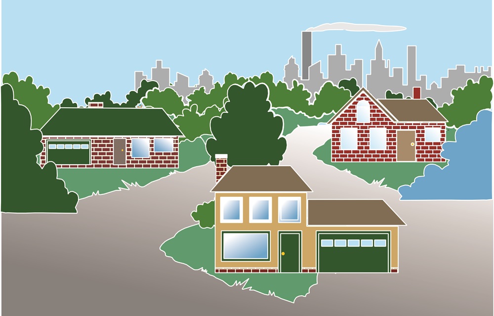 An illustrated graphic shows houses sitting in front of a factory