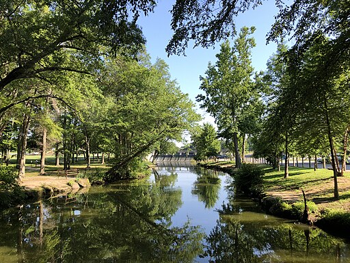 A small river leading to a dam.
