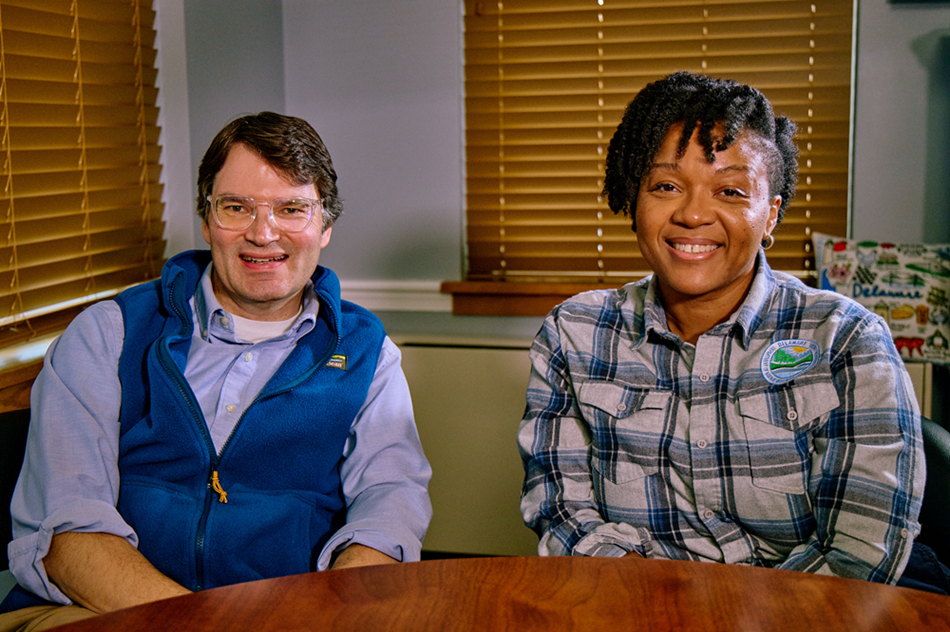DNREC Secretary Greg Patterson and Deputy Secretary Dayna Cobb pose for a photo in an office.